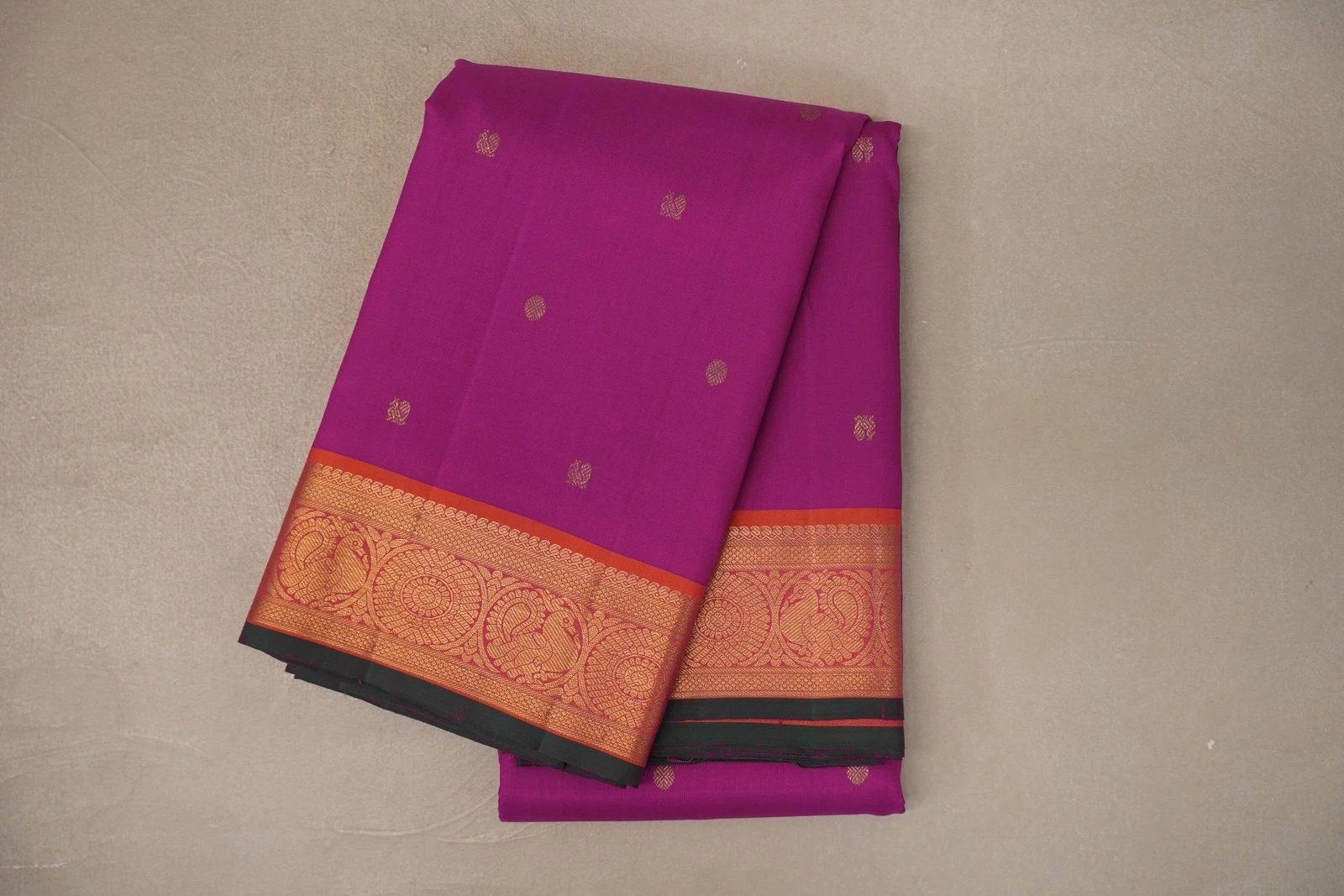 Bright magenta vintage Kanjivaram silk saree with gold zari peacock border