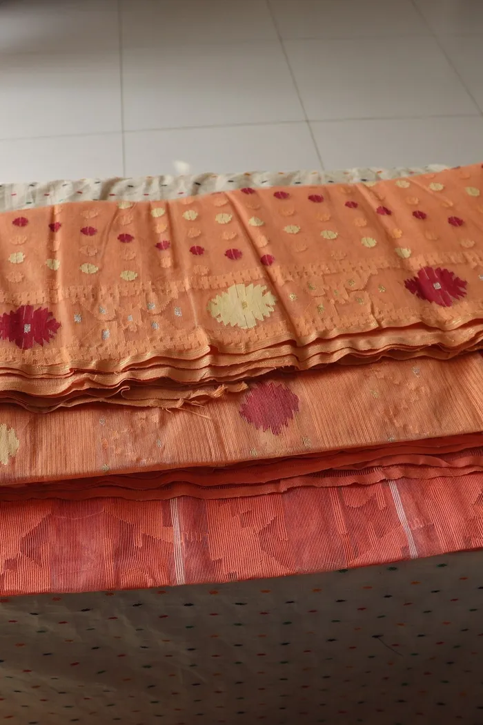 Peach Dhakai Jamdani Saree With Floral Buti